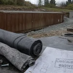 Enterrer un container : chantier semi-enterré, gravier drainant et membrane EPDM contre l’humidité